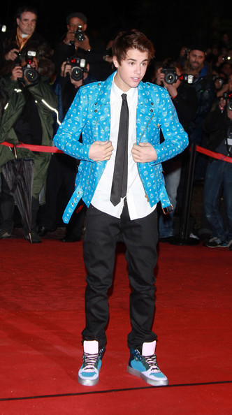 Justin-Bieber-wearing-TIA-Phenomenon-MCM-biker-motorcycle-jacket-NRJ-Awards-Balenciaga-Patchwork-Multicolor-High-Top-Sneakers-Spring-2012-Collection Justin Bieber in TIA Phenomenon Jacket and Balenciaga Sneakers